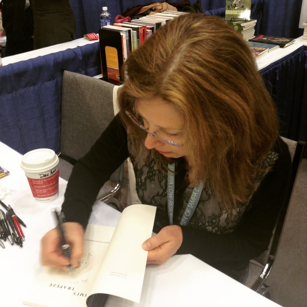 J. Allyn Rosser signing "Mimi's Trapeze"