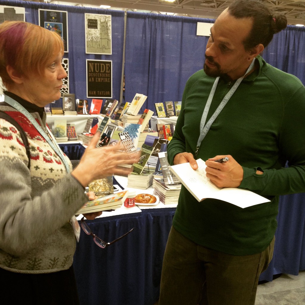 Ross Gay signing "Catalog of Unabashed Gratitude"