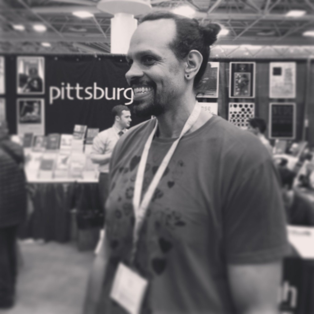 Ross Gay at the University of Pittsburgh Press booth at AWP 2015